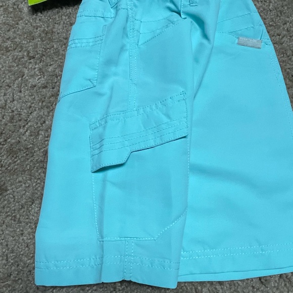REGATTA GREAT OUTDOORS KIDS SORCER CARGO WALKING SHORTS. COOL AQUA. SIZE 7-8. - Picture 7 of 13